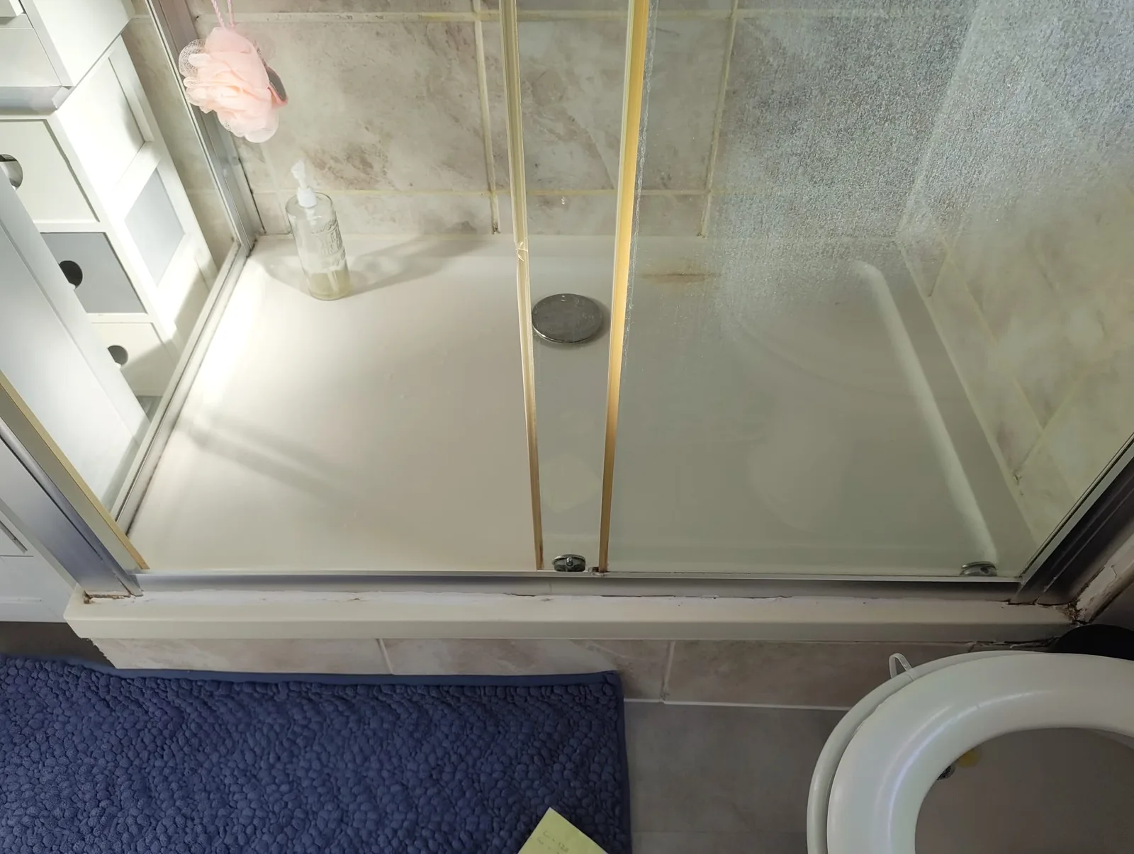 Damaged leaking shower tray before removal in a residential bathroom in Basildon SS13